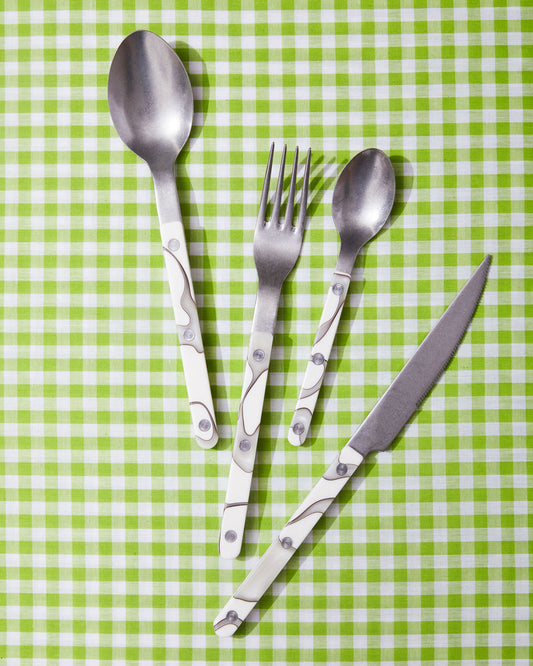 Sabre flatware in Dune Ivory