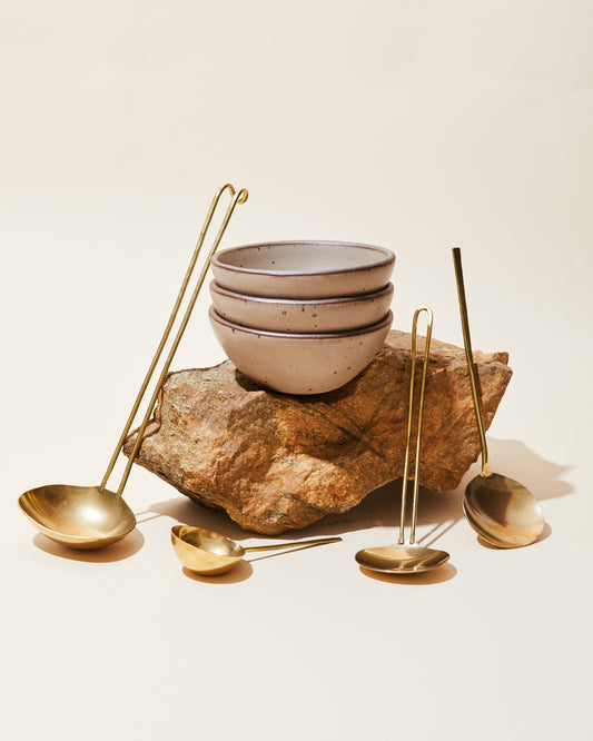 Brass serving ware by Lue Brass