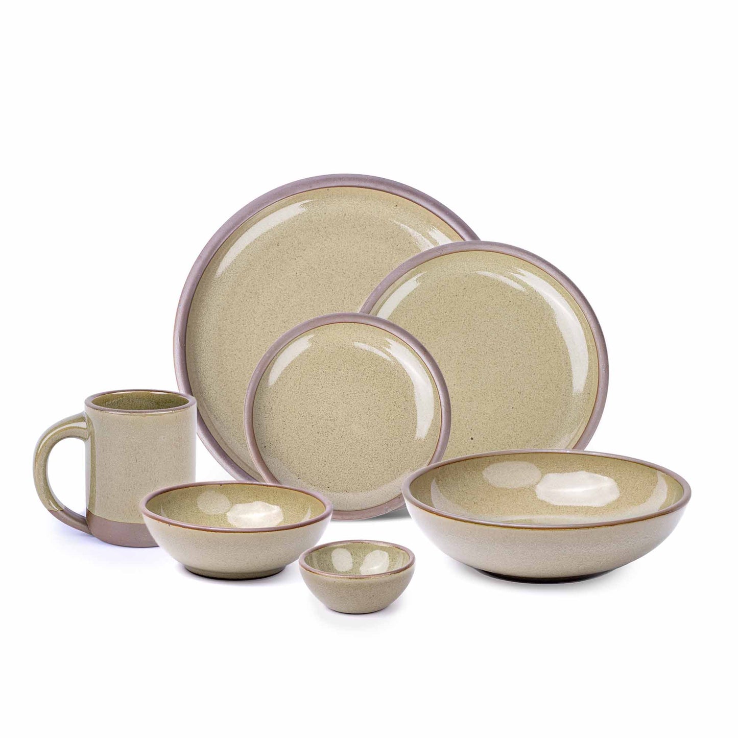 The Mug, bitty bowl, breakfast bowl, everyday bowl, cake plate, side plate and dinner plate in a reflective dappled grey-green color featuring unglazed rims